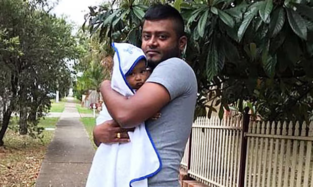 Mr Gnaneswaran holding his infant daughter. He was forcibly deported in the middle of the night in 2018 & has no way to ever see his wife and child again. (image: Tamil Refugee Council)