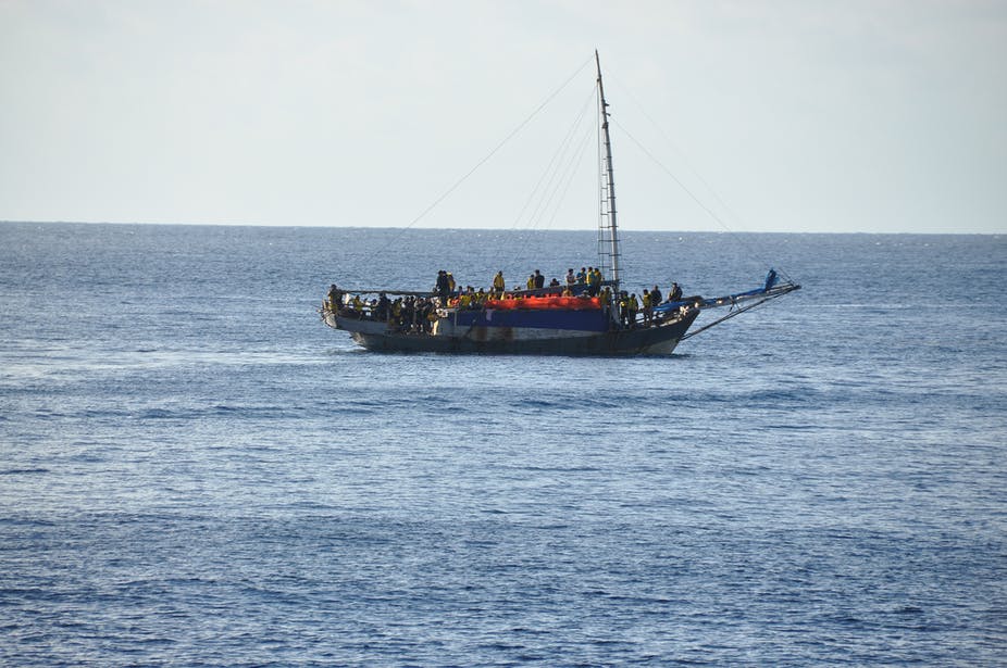 People seeking asylum on a boat near Christmas Island, 350km from Indonesia & 1,500km west of the Australian mainland (image: Josh Jerga/AAP)